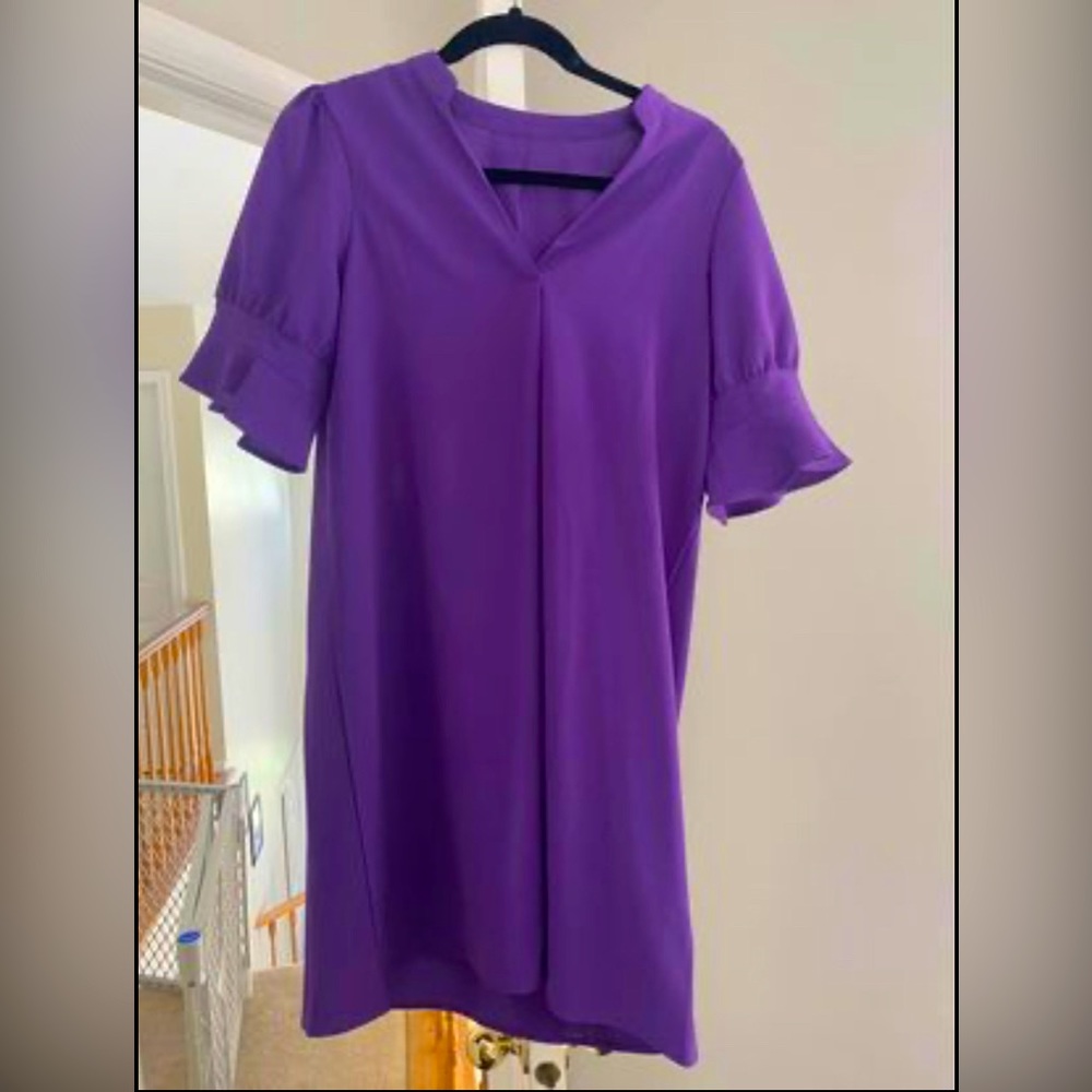 Brand new purple shirt dress. Never worn.